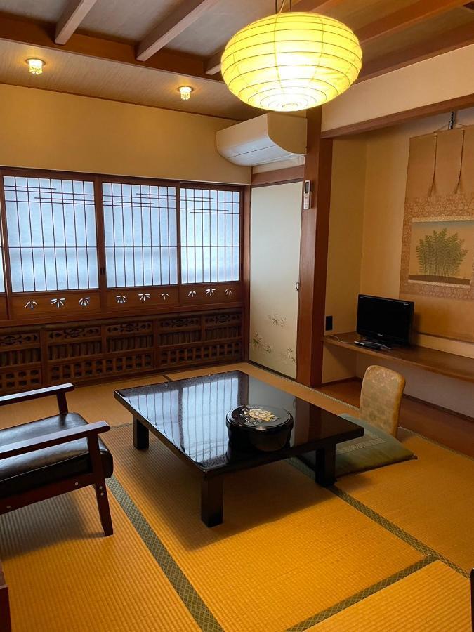 Sangai Ryokan Gotsu Bagian luar foto