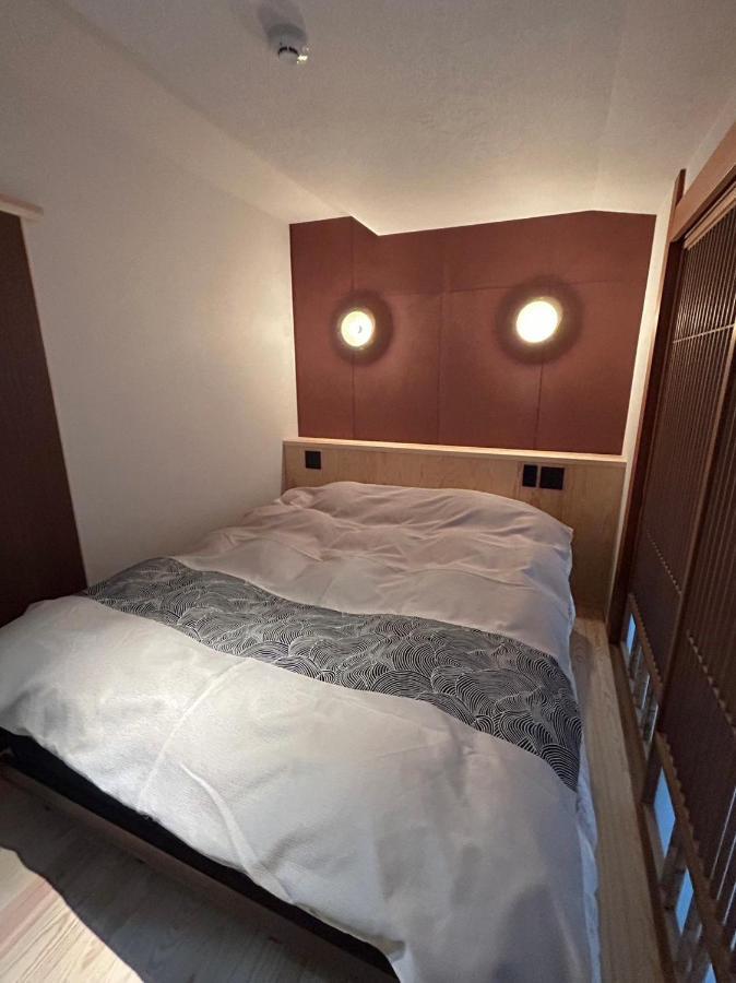 Sangai Ryokan Gotsu Bagian luar foto